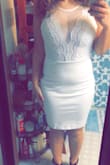 The material is amazing! I was scared due to the white because with other dresses white is usually see through but this is nicely made. I love how it looks, fights & feels!!! - Araya B.