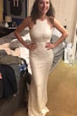 Has some stretch and fits perfectly! Love the cut and flow. - Ani M.
