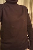That's exactly what this sweater is, cozy. I don't normally prefer to wear turtleneck sweaters, but this one is great. I don't feel choked at all. Can be dressed up or down easily. New favorite! - Stephanie A.