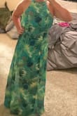 Absolutely stunning from a color and design perspective. The bottom half is sheer but conservatively sheer so you can only tell in the light. The slits are discreet and with the high neckline everything compliments the whole style perfectly. I am larger in the chest area and with the tied back will be able to go without a bra. Also, being 5'6" I can pull off heels. Will be wearing for a Bahamas vacation. LOVE! - Hannah M.