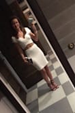 Fits like a glove. Personally the skirt was an inch or so long but I'm pretty petite. The fabric wrinkles quickly. - Maggie W.