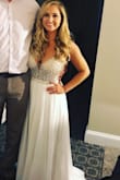 This dress is absolutely stunning ! I could have definitely used it as my wedding gown but I ended up using it for the rehearsal dinner since I already had a wedding dress. It fits greats and it's amazing quality. I did have to get it hemmed since I'm so short but that was the only alteration I needed. The only warning I have for the dress is the middle section is totally see through which I didn't really notice at first when I ordered it but since I have a short torso it wasn't really noticeable! - Heather R.