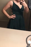 It fit really well but I will need some sticky-boob inserts because I have a small chest. I like that I can see my tattoo and it wasn't too short. The color was also really nice. - Emma K.