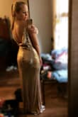 This dress is beautiful. The only downside is the sequins fall off, but it is only noticeable on the ground. The dress is comfortable and beautiful. - Christy H.