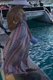 Love this dress! The silky material feels so wonderful. Very flowy and fabulous. The strap ties are ridiculously long, so I opted to make it a halter dress with the front two and cut the back ones out. Love the dress! - Makani A.
