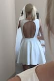 Super fun dress. On the twirl scale 10/10. The material is great quality and it's simple yet classy. - Sandy N.