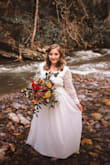 This dress required hemming due to my height, but was perfect every other way! - Kayla L.