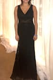 Loved the dress. Received many compliments on it. Very comfortable, classy look. Sized up based on reviews and wish I didn't. I felt that it stretched as I wore it so it wasn't as fitted in the waist and shoulders as I would have liked. I'm usually a M/L and ordered an XL, also because that's all that was available. - Rosella M.