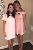 I love this dress so much! I wore it for formal recruitment and even with super tall wedges the dress was not too short! I was a lot tanner when I wore it but I am thinking of buying a darker color version for the Winter months! it is more of a jersey material, so it does hug in some places (not always the best places) but it is an amazing buy! - Ally R.