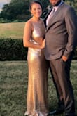 I ordered this as a bridesmaids dress and since I was pregnant at the time I wasn't sure what to order. When I wore the dress this past September I weighed 135 lbs and I ordered the large. The straps and breast area is very large but the stomach and hip area is quite tight. Many of the other bridesmaids ordered larger and wore spanx.
I also had go get it hemmed since it was very long - I still wore 4 inch heels being 5'4". - Elizabeth E.