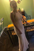Just like on the picture. I loved it! I ordered the XS because they did not have S available. My actual size is S. I had to bring it to my tailor so she would open the back of the dress a little more so I could breath! It fits like a glove now. - Lais C.