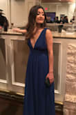 Great dress. Obviously way too long for my height, ended up taking it to a tailor to get several inches cut off the bottom, but once that was done the dress fit great. It's very low cut so I did't wear a bra, used double-sided adhesive tape to make sure I didn't have any slips. Loved the dress! Will be wearing again. - Fabiola C.