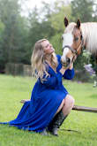 I absolutely adore this dress. It is elongating, flowy, and highlights all the right features. I used this for a photo shoot with my horse and wore boots - I wish I would have hemmed it. Had I worn heels it would have been perfect. I also wore a white bralette with it to casual it down and it was perfect with the little bit of lace in the bust. - Danyelle H.