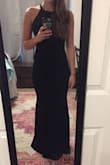 It fits me perfectly! Will not even have to hem with heels. Material is great and stretchy and the beads were a nice touch! Highly recommend. - Sarah F.