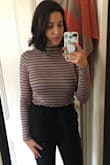 I feel so cute in this top. I ordered a L based off of reviews and I am so glad that I did. I usually wear a S or M. The fabric is soft, stretchy, and not see-through - which is so important for my bust. I want it in more colors! - Rebecca R.