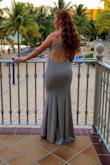 This dress was amazing! I ordered a size bigger than normal for fear the length would be too short but it wasn't! In fact, I had to hem it a bit even with heels! I wore this to a wedding and loved it. Loved how it made me feel and showed just the right amount of skin. - Kelsey N.