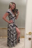 The material of the dress is much thinner then I was expecting. At first I thought it felt a little too "cheap" (for lack of a better word) but it's a tropical summer dress so it should be super breezy, right?! It also has a VERY low-cut neckline, so you busty ladies may need a bralette underneath, or prepare for some serious attention! - Lara S.