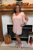 I loved the dress. I was worried it wouldn't fit right so I had it shipped overnight. I also loved the shoes although I wish I would have ordered them a half size bigger. - Wendy H.