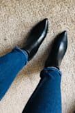 After reading the reviews on this booties, I've decided to purchase a black pair. I'm usually a size 6.5 but got the 7 because of the pointed toe, knowing I'd wear these with socks (normal usual running socks), I'd need some space without cramping. Got them a day early and tried them on. They fit perfectly, they weren't too tight nor too loose, easy for me to take them off without struggling and putting them on was a breeze as well. Definitely recommend these to anyone. - Rafhanah P.