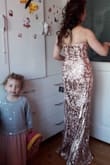 Absolutely gorgeous. High standards dress. Beautifully shaped, high shine dress. - Ia B.