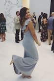 I wore this dress to a wedding and received so many compliments. I absolutely loved the fit of this dress. If you wear a smaller bra size, it may be a little loose up top but other than that it's fitted around your waist/thighs and then flows out. I love it so much. My new favorite dress. - Alyssa W.