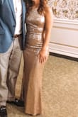 I wore this for my wedding rehearsal dinner. The fabric is stretchy so it fit very nicely and it's lined so it wasn't itchy at all! I don't like the look of adjustable straps as I think they look cheap, so I had those removed and the straps shortened to fit me, as well as having it hemmed. I got sooo many compliments! - Lauren L.