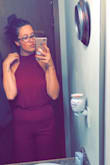 My first jumpsuit and it's gorgeous!!! It fits true to size, it's a little loose around the side bust area, but nothing fashion tape can't fix. And a little tight around the stomach. The length is perfect being tall!! - Rubie J.