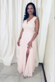 The dress is everything you see in the picture; color, fabric and flow. Fits a little bit tight around the waist, but wouldn't change it for a M. I just love it. - James G.