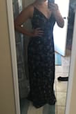 I wish I had gone down in size but this dress is gorgeous! It's so comfortable and great for girls with broad shoulders. Definitely a little long, but I'm also really short. - Esther S.