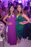 I love this style dress. It's simple, yet the flow makes it dressy and the back makes it sexy. The straps are easily adjustable. I'm very short, so I had to alter the length. The dress is more of a vibrant purple shade then pink shade In the picture. - Hallie T.