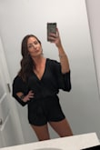 It's a loose garment with lots of room to move in. I would size down. I am a small in Lulus clothing and I got an XS. It fit perfect around the bum, and the elastic was comfortable around the waist. - Vivienne K.