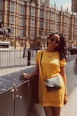 great color, especially if you're going on a vacation. It really pops against dull backgrounds. The dress itself is super comfortable, but after a couple of washes the inside fabric tends to jut out from under the dress (but doesn't bother me that much). Really happy with this! - Aarthi S.