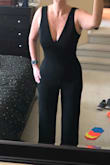 Hugs all the right places. Has some stretch in the fabric. Is long but with heels will look even better. The front and back V are quite low so my regular bra shows the strap in the back a little, so I will use a V front backless sticky bra. So pleased how this looks and feels I immediately ordered another jumpsuit different style. This is my first order of Lulus. It also came really fast. - Shandra F.