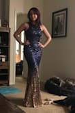 Wore this to a wedding, everyone loved it! It is a bit long but I am a bit on the short side. I am wearing my tallest heels in the picture and it is just a smidge too long. I could still walk easily though without stepping on it. Beware though, with sequins comes slight chafing under the arms. It has a tiny bit of stretch to the material so a strapless bra looks nice in it (not wearing any in the photo). It hugged my curves nicely though it could have been a tiny bit tighter through the waist. Overall a very comfortable fit. Gorgeous!!! - Brie B.
