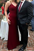 The fit was true to size for me. I was able to comfortably wear a strapless bra with this dress and low heels. The length of the dress was just above the floor. The cut was somewhat awkward on the top and I could hear seams pop on the straps even though the dress was not at all tight there! Only 4/5 instead of 5/5 because of the seams popping on the straps, I feel like they could be a little more sturdy. - Nicole V.