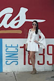This dress is perfect for a spring or summer day out. Material is light. Dress runs short, so if you're tall it might be smart to size up. Sleeves also run a bit tight. - Kristina B.