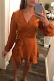 This dress is so flattering! It was a little loose up top but nothing a little double sided tape couldn't fix! I got SO many compliments, and the material is high quality! - Elena T.