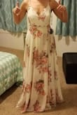 This dress is so pretty! It's almost near impossible for me to find a maxi that is long enough and this one was even long on me. I love the way it moves when I walk in it. I feel as though it would be very forgiving for someone who is self conscious about their midriff as well. That being said, I will (begrudgingly) be returning it because I was between this dress and another Lulu's dress to wear as a bridesmaids dress. While this dress is beautiful, I feel like it didn't really do a lot for my figure (compared to the other one that I bought that was more form fitting). I wish I had something else to wear it to, because I would definitely keep it! - Laura M.