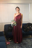 The color is a bright color so it stands out although it's a dark red. Good thick fabric, which is good for cold weather weddings. Many compliments. Most important to find the style that fits you best. One shoulder looked best on me and can't wait to try all the other options of wearing the dress! - Jeea Y.
