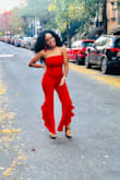 LOVED this. I first bought it in Small but ended up reordering a XS & it was a hit! I felt like a hot tamale in this red light shut down!!! Being so small with curves, clothes typically wear me but honey I wore this romper!! It was for my 29th birthday & it made me feel like a million bucks. Everyone loved it. - Caroline M.