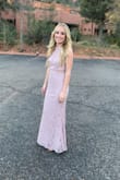 This dress was more than I imagined it would be. It was pretty long, I had about 5 inches taken off. I bought this dress to wear to a gala and I received compliments the whole night!! - Melissa K.
