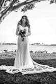 This beautiful dress was my wedding dress. It was a little large so I also ordered an XS size but I returned it as it was too tight. Although I needed some alterations on the dress, I loved the dress overall and wore it happily at my wedding. I altered the shoulders and the length because I'm short and I also altered the bust area as it was a little large. I loved the material and the way it fits. Everyone loved it too. It's a perfect and affordable option for a wedding dress. I would highly recommend to everyone! - Ece T.