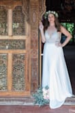 I absolutely loved this dress and got so many compliments when wearing it! We eloped to Costa Rica and I needed something gorgeous but also somewhat simple, lightweight and affordable and this was perfect. Everyone thought I paid a fortune for it and it even fit comfortably in my 20" carry-on. All I had to do was a quick steam the day of and it was ready to go. True to size, and great for people like me that have a shorter torso. The chest was a tad big for me and if you don't stand straight the fabric on the back slouches a bit, but other than that no complaints. It really was everything I could have hoped for in a dress. Highly recommend! - Angel W.