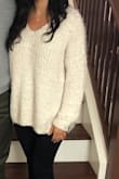 This sweater is that go to cute sweater that you want to comfortably hang out in while still looking cute and warm. It has a cute young fit and is true to size. It sheds a little but nothing crazy. Would highly recommend with coco and hallmark movies. xoxo - Andrea M.