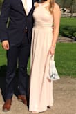 I order the Taupe color at first, but it was more gray than purple. So I ended up ordering the Peach color instead. It was a little tight around my hips, but it was perfect overall. A little too long for me. I had to sew up the end a bit but it was totally worth it. I worn it to my friends wedding. - Madeleine T.