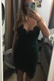 This dress is that perfect combination of sexy and classy. It hugs all my curves perfectly without highlighting any of my problem areas and the slit adds just the right amount of leg. I want to go back and order it all over again in every color! - Elizabeth R.
