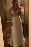 This dress is gorgeous, buy it now! The pictures will never do it justice. I'll be using it for my wedding next summer, I don't think I could of found a more perfect dress for me. I'll have to have it hemmed A LOT, but other than that it's seriously perfect. - Ashley C.