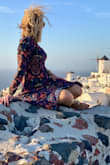 I bought this dress for a fall wedding and wore it in Greece beforehand. The colors turned out beautiful and the fit was perfect, true to size. - Meagan M.