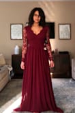 This dress is so beautiful, detailed and vibrant!!! Love that merlot color. I will warn it runs long, I will have to wear 4 inch heels. The arms were tight but luckily I could safely stretch the lace. Also raising my arms is a bit difficult. I love this dress though!!! - Celina W.