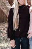 I definitely thought this would be long enough to wear as a dress, however it would not have been appropriate to wear with out something underneath it. I loved it as a sweater though and it is sooo soft and comfortable! - Maddie